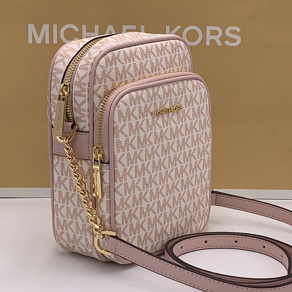 MICHAEL KORS
Jet Set Travel Md Signature Logo Crossbody
OPTIC WHITE/RS GOLD
NWT - Picture 4 of 16